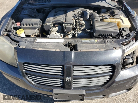 2005 Dodge Magnum SE z VIN 2D4FV48V55H533891, wystawiony jako Copart lot #74751644 z przebiegiem 287 869 mil mil oraz Szkoda całkowita • Salvage title. Historia ofert i sprzedaży dostępna na DreamBid. Obrazek 12.