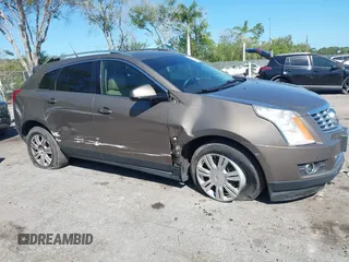 2014 Cadillac SRX Luxury Collection z VIN 3GYFNEE3XES587233, wystawiony jako IAAI lot #41747779 z przebiegiem 116 571 mil mil oraz . Historia ofert i sprzedaży dostępna na DreamBid. Obrazek 6.