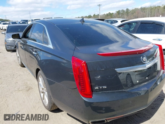 2013 Cadillac XTS Premium with VIN 2G61S5S33D9113653, listed as a IAAI auction lot 41837117 with 101,049 mi miles and . Bid and sale history available at DreamBid. Image 3.