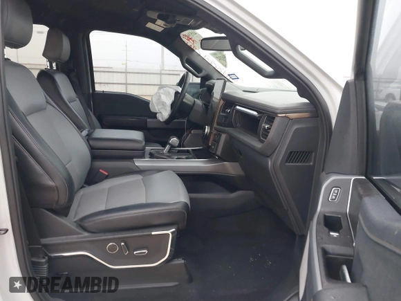 2023 Ford F-150 Lightning Pro z VIN 1FTVW1EL7PWG19070, wystawiony jako IAAI lot #41536193 z przebiegiem 22 654 mil mil oraz . Historia ofert i sprzedaży dostępna na DreamBid. Obrazek 5.