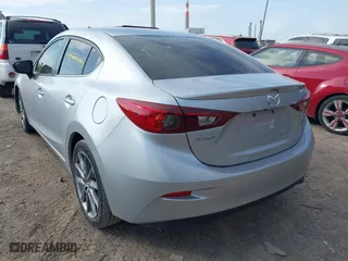 2018 Mazda Mazda3 4-Door Touring with VIN 3MZBN1V37JM262418, listed as a IAAI auction lot 41880212 with 118,662 mi miles. Bid and sale history available at carsss.com. Image 3.