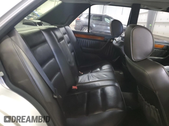1995 Mercedes-Benz E 320 with VIN WDBEA32E2SC168493, listed as a Copart auction lot 82365704 with 102,066 mi miles and Salvage Title. Bid and sale history available at DreamBid. Image 10.