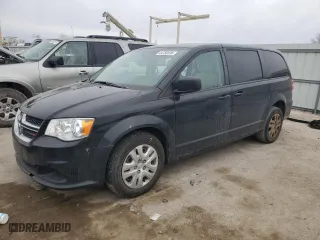 2018 Dodge Grand Caravan SE with VIN 2C4RDGBGXJR137257, listed as a Copart auction lot 44750595 with 128,236 mi miles and Salvage Title. Bid and sale history available at carsss.com. Image 1.