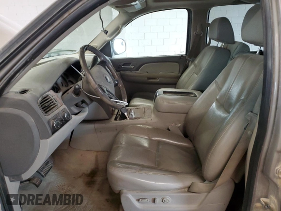 2007 Chevrolet Tahoe LT z VIN 1GNFK130X7J373208, wystawiony jako Copart lot #60710515 z przebiegiem 304 885 mil mil oraz Szkoda całkowita • Salvage title. Historia ofert i sprzedaży dostępna na DreamBid. Obrazek 7.