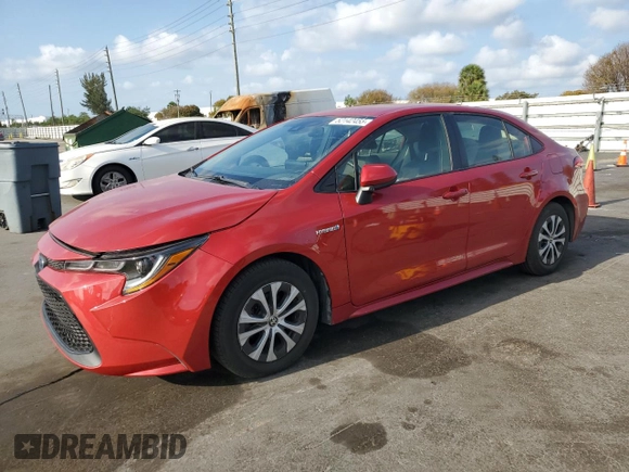 2021 Toyota Corolla Hybrid LE with VIN JTDEAMDE5MJ012662, listed as a Copart auction lot 52142455 with 138,564 mi miles and Clean Title. Bid and sale history available at carsss.com. Image 1.