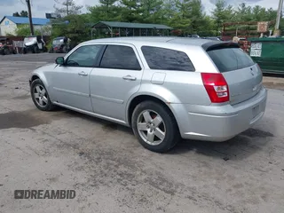 2005 Dodge Magnum SXT z VIN 2D4GZ48V358579406, wystawiony jako IAAI lot #42198627 z przebiegiem 264 473 mil mil oraz . Historia ofert i sprzedaży dostępna na DreamBid. Obrazek 3.