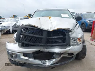 2004 Dodge 1500 SLT with VIN 1D7HA18N84S645016, listed as a IAAI auction lot 42107556 with 218,938 mi miles and . Bid and sale history available at DreamBid. Image 6.