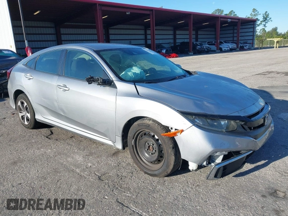 2020 Honda Civic LX with VIN 19XFC2F63LE004953, listed as a IAAI auction lot 41824922 with 71,458 mi miles and . Bid and sale history available at DreamBid. Image 1.