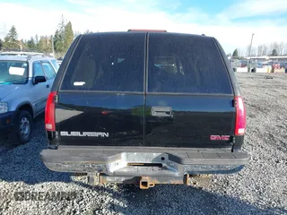 1999 GMC Suburban z VIN 3GKFK16R2XG524342, wystawiony jako IAAI lot #41682292 z przebiegiem 161 536 mil mil oraz . Historia ofert i sprzedaży dostępna na DreamBid. Obrazek 16.