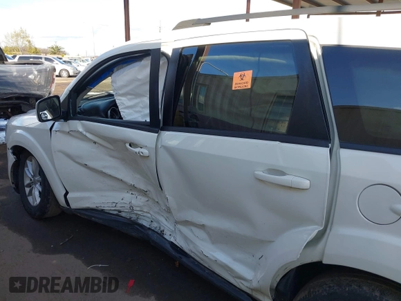 2014 Dodge Journey SXT with VIN 3C4PDCBGXET122969, listed as a IAAI auction lot 41741679 with 151,285 mi miles. Bid and sale history available at carsss.com. Image 6.