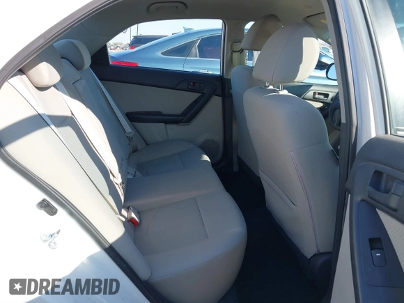 2010 Kia Forte EX with VIN KNAFU4A27A5310573, listed as a IAAI auction lot 41398134 with 167,264 mi miles. Bid and sale history available at carsss.com. Image 8.