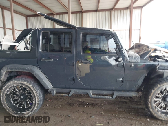 2016 Jeep Wrangler Unlimited Freedom с VIN 1C4BJWDG9GL319356, выставлен на аукционе IAAI как лот 42113994 с пробегом Не указан миль и . История ставок и продаж доступна на DreamBid. Изображение 13.