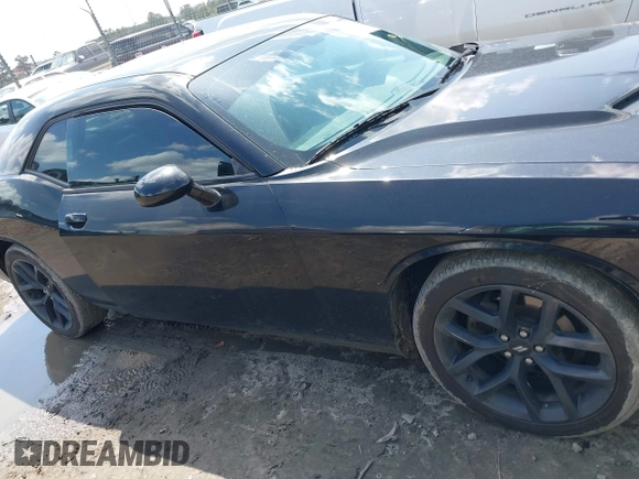 2019 Dodge Challenger SXT z VIN 2C3CDZAG3KH507625, wystawiony jako IAAI lot #41915138 z przebiegiem 125 619 mil mil oraz . Historia ofert i sprzedaży dostępna na DreamBid. Obrazek 13.