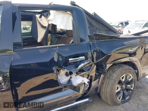 2021 Nissan Titan Pro-4X with VIN 1N6AA1ED4MN515673, listed as a IAAI auction lot 42028678 with 128,719 mi miles and . Bid and sale history available at DreamBid. Image 13.