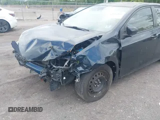 2018 Toyota Corolla L with VIN 2T1BURHE6JC995411, listed as a IAAI auction lot 42516337 with 98,066 mi miles and . Bid and sale history available at DreamBid. Image 6.