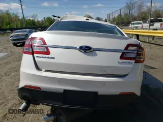 2016 Ford Taurus Limited z VIN 1FAHP2F86GG104703, wystawiony jako Copart lot #52086535 z przebiegiem Nie podano mil oraz Szkoda całkowita • Salvage title. Historia ofert i sprzedaży dostępna na DreamBid. Obrazek 6.