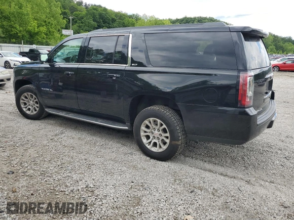 2019 GMC Yukon XL SLT with VIN 1GKS2GKC5KR166603, listed as a Copart auction lot 57913715 with 126,609 mi miles and Salvage title. Bid and sale history available at DreamBid. Image 2.