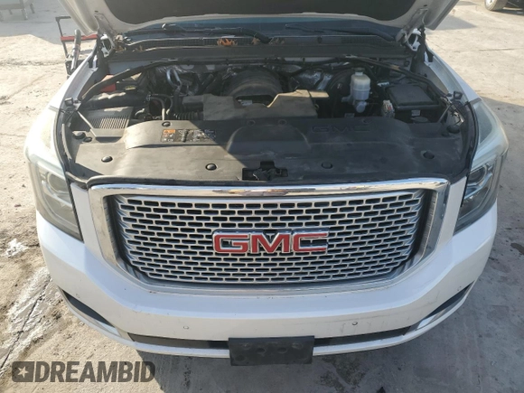 2016 GMC Yukon XL Denali with VIN 1GKS2HKJXGR220635, listed as a Copart auction lot 48920655 with 113,924 mi miles and Salvage Title. Bid and sale history available at DreamBid. Image 12.