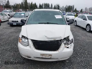 2005 Chrysler Town & Country Touring with VIN 2C4GP54L25R395372, listed as a IAAI auction lot 41805284 with 143,431 mi miles. Bid and sale history available at carsss.com. Image 12.