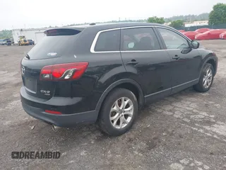 2013 Mazda CX-9 Touring z VIN JM3TB3CV4D0421734, wystawiony jako IAAI lot #42198678 z przebiegiem 131 063 mil mil oraz . Historia ofert i sprzedaży dostępna na DreamBid. Obrazek 4.