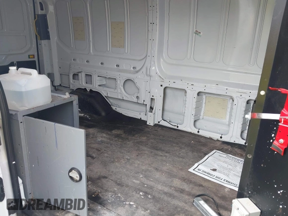2015 Ford Transit with VIN 1FTNE2CV5FKA07968, listed as a IAAI auction lot 42693006 with 133,500 mi miles and . Bid and sale history available at DreamBid. Image 8.