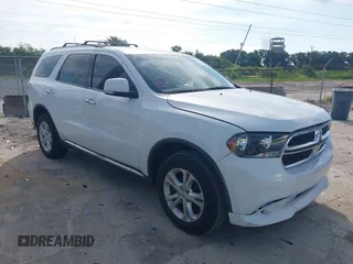 2013 Dodge Durango Crew with VIN 1C4RDHDGXDC608209, listed as a IAAI auction lot 42779231 with 203,460 mi miles and . Bid and sale history available at DreamBid. Image 1.