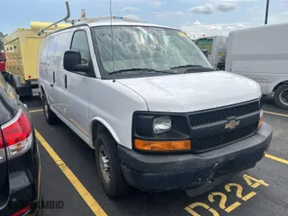 2013 Chevrolet Express Cargo Van with VIN 1GCWGFBA3D1193016, listed as a IAAI auction lot 42143277 with 206,700 mi miles. Bid and sale history available at carsss.com. Image 1.