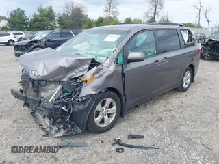 2015 Toyota Sienna LE AAS with VIN 5TDKK3DC8FS655960, listed as a IAAI auction lot 42031334 with 132,102 mi miles. Bid and sale history available at carsss.com. Image 2.