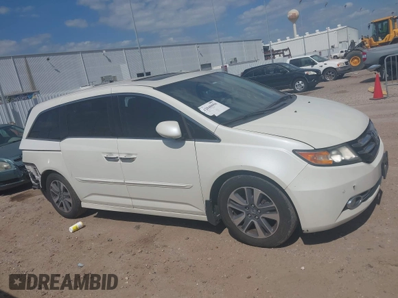 2016 Honda Odyssey Touring Elite with VIN 5FNRL5H98GB102544, listed as a IAAI auction lot 42040050 with 128,957 mi miles and . Bid and sale history available at DreamBid. Image 14.