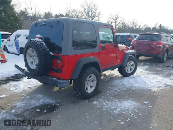 2005 Jeep Wrangler Rubicon with VIN 1J4FA69S25P316085, listed as a IAAI auction lot 41503034 with 57,252 mi miles. Bid and sale history available at carsss.com. Image 4.