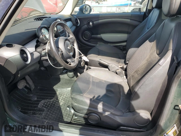 2012 MINI Hardtop with VIN WMWSU3C51CT253947, listed as a Copart auction lot 55210405 with 139,535 mi miles and Salvage Title. Bid and sale history available at DreamBid. Image 7.