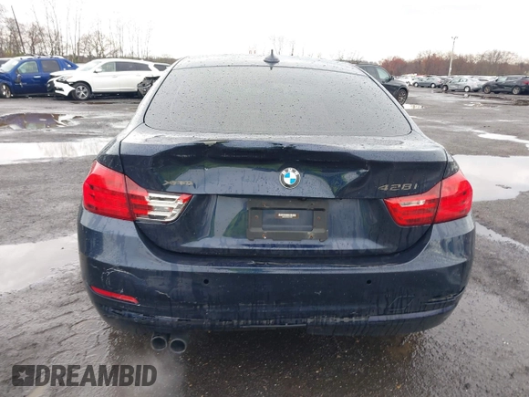 2016 BMW 4 Series 428i xDrive with VIN WBA4C9C59GG137067, listed as a IAAI auction lot 41913733 with 104,378 mi miles and . Bid and sale history available at carsss.com. Image 19.
