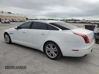 2014 Jaguar XJ Portfolio with VIN SAJWJ2GD6E8V65987, listed as a Copart auction lot 50091105 with 136,080 mi miles and Clean title. Bid and sale history available at DreamBid. Image 2.