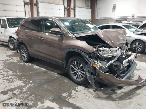 2019 Toyota Highlander SE with VIN 5TDJZRFH5KS973127, listed as a IAAI auction lot 41566877 with 63,557 mi miles. Bid and sale history available at carsss.com. Image 1.