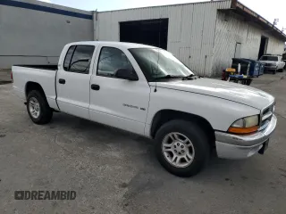 2001 Dodge Dakota Sport with VIN 1B7GL2AN21S131366, listed as a Copart auction lot 81263154 with 272,938 mi miles and Salvage Title. Bid and sale history available at DreamBid. Image 4.