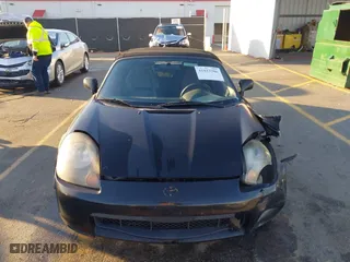 2000 Toyota MR2 Spyder with VIN JTDFR3204Y0020262, listed as a IAAI auction lot 41823386 with 203,044 mi miles. Bid and sale history available at carsss.com. Image 12.