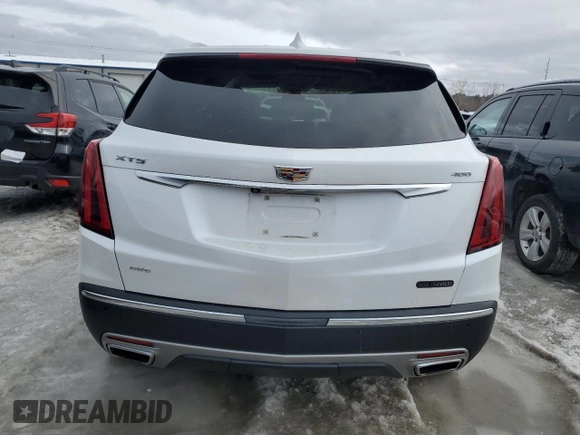 2020 Cadillac XT5 Premium Luxury AWD with VIN 1GYKNDRS6LZ121017, listed as a Copart auction lot 42647785 with 81,296 mi miles and Salvage Title. Bid and sale history available at DreamBid. Image 6.