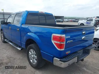 2014 Ford F-150 XL with VIN 1FTFW1CT6EKF05542, listed as a IAAI auction lot 42335272 with 169,985 mi miles and . Bid and sale history available at DreamBid. Image 3.