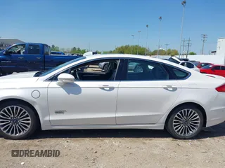2017 Ford Fusion Titanium with VIN 3FA6P0SUXHR147336, listed as a IAAI auction lot 41873106 with 103,247 mi miles and . Bid and sale history available at DreamBid. Image 14.
