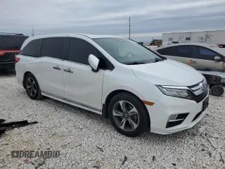 2020 Honda Odyssey Touring with VIN 5FNRL6H88LB014164, listed as a Copart auction lot 42925415 with 67,667 mi miles and Salvage title. Bid and sale history available at DreamBid. Image 4.