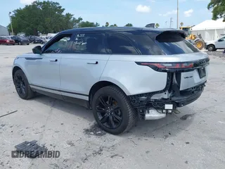 2021 Land Rover Range Rover Velar R-Dynamic S z VIN SALYT2EX9MA315965, wystawiony jako IAAI lot #42344448 z przebiegiem 66 819 mil mil oraz . Historia ofert i sprzedaży dostępna na DreamBid. Obrazek 3.