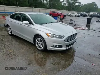 2016 Ford Fusion SE Hybrid z VIN 3FA6P0LUXGR350997, wystawiony jako Copart lot #62301825 z przebiegiem 267 537 mil mil oraz Szkoda całkowita • Salvage title. Historia ofert i sprzedaży dostępna na DreamBid. Obrazek 13.
