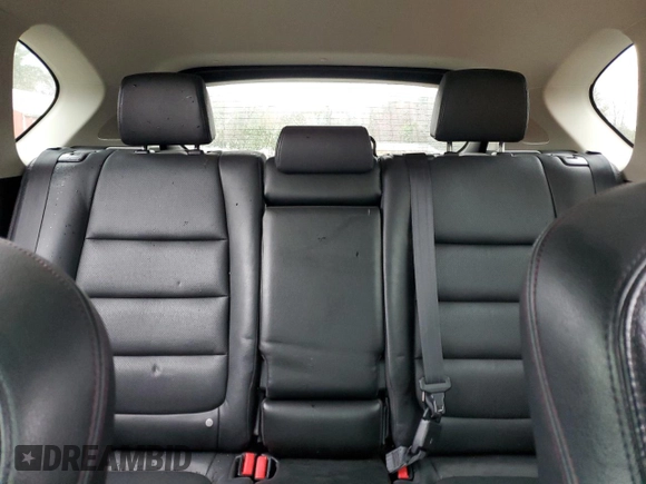 2016 Mazda CX-5 Grand Touring with VIN JM3KE4DY6G0834583, listed as a Copart auction lot 52015905 with 184,741 mi miles and Salvage Title. Bid and sale history available at DreamBid. Image 10.