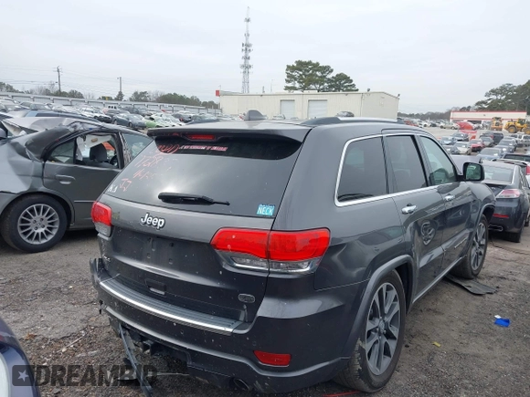 2017 Jeep Grand Cherokee Overland with VIN 1C4RJFCG8HC772837, listed as a IAAI auction lot 41304895 with 71,338 mi miles. Bid and sale history available at carsss.com. Image 4.