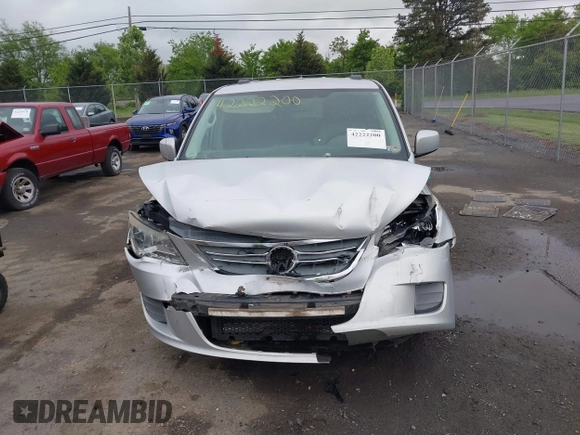 2011 Volkswagen Routan SE z VIN 2V4RW3DGXBR772583, wystawiony jako IAAI lot #42222200 z przebiegiem 213 724 mil mil oraz . Historia ofert i sprzedaży dostępna na DreamBid. Obrazek 12.