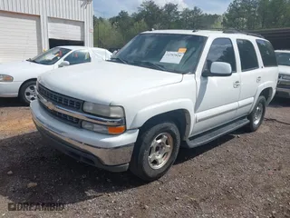 2004 Chevrolet Tahoe LT with VIN 1GNEC13Z44R192822, listed as a IAAI auction lot 41797924 with 211,818 mi miles. Bid and sale history available at carsss.com. Image 2.
