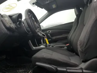2012 Honda CR-Z with VIN JHMZF1D45CS001998, listed as a Copart auction lot 88301985 with 146,306 mi miles and Salvage title. Bid and sale history available at DreamBid. Image 7.