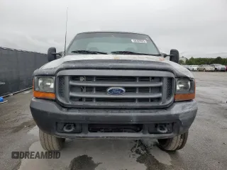 2000 Ford F-250 XL with VIN 1FTNX21F3YED35736, listed as a Copart auction lot 50309805 with 303,811 mi miles and Salvage title. Bid and sale history available at DreamBid. Image 5.