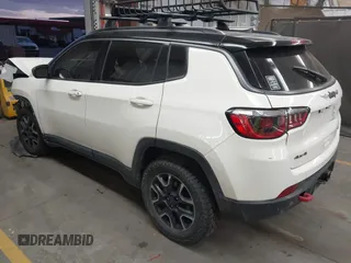 2019 Jeep Compass Trailhawk with VIN 3C4NJDDB8KT668110, listed as a IAAI auction lot 41700848 with 75,855 mi miles and . Bid and sale history available at carsss.com. Image 3.