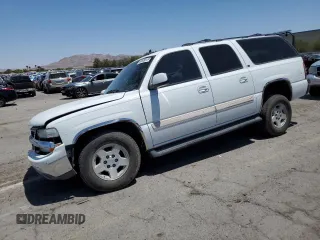 2006 Chevrolet Suburban Z71 with VIN 1GNFK16Z76J167997, listed as a Copart auction lot 60655015 with 66,486 mi miles and Salvage title. Bid and sale history available at DreamBid. Image 1.